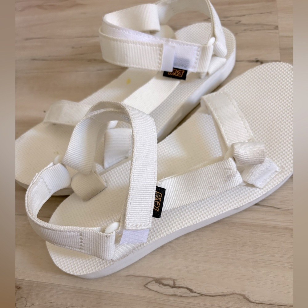 White Teva sandals